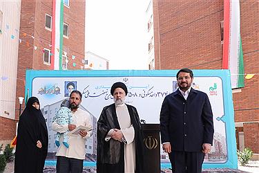 تصویر برگزاری مراسم واگذاری زمین و مسکن طرح نهضت ملی مسکن